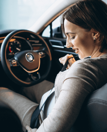 A Girl Attach the seat belt