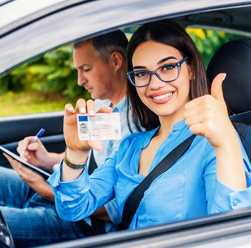 A Girl showing their Driving Licence
