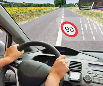 Driving car metion 90 speed limit in windshield