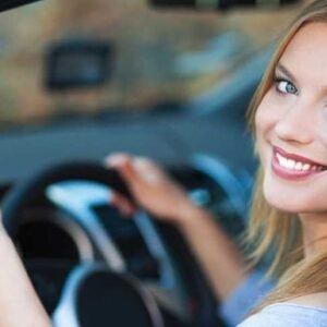 Female student driver passing SAAQ road test after Montreal driving lessons.