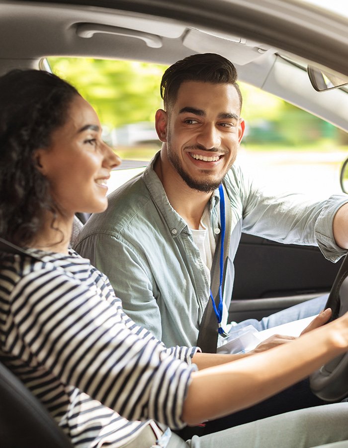 Driving instructor teaching student in Montreal — Ecole Unity driving lessons.