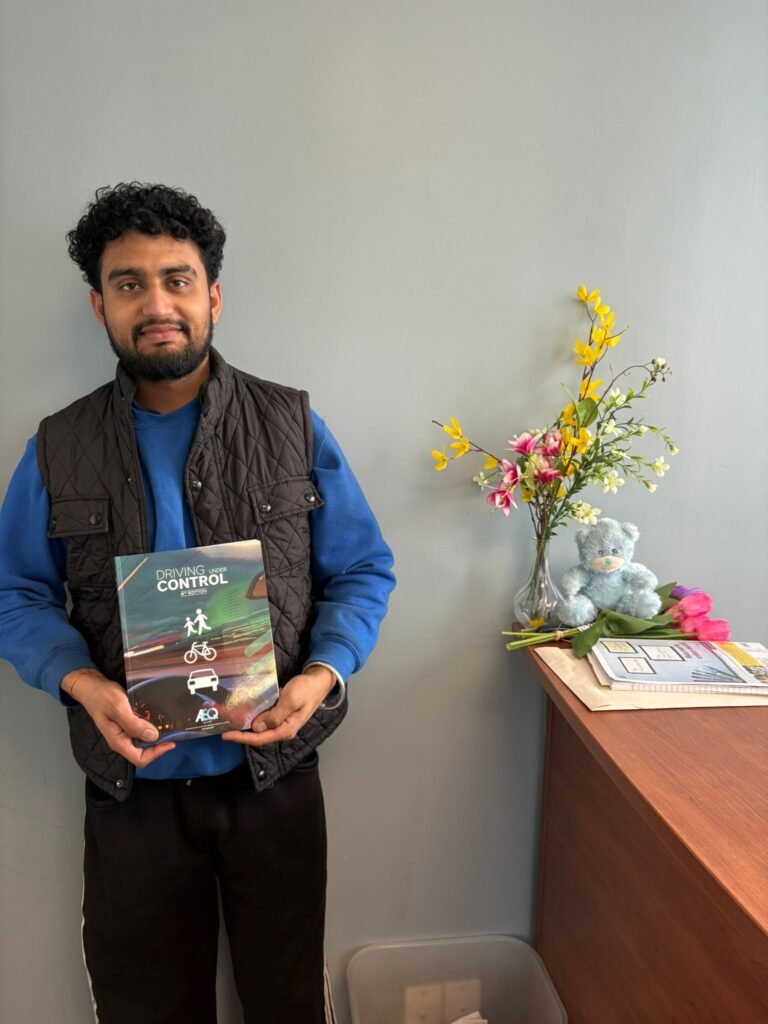 student testimonial photo after passing license exam