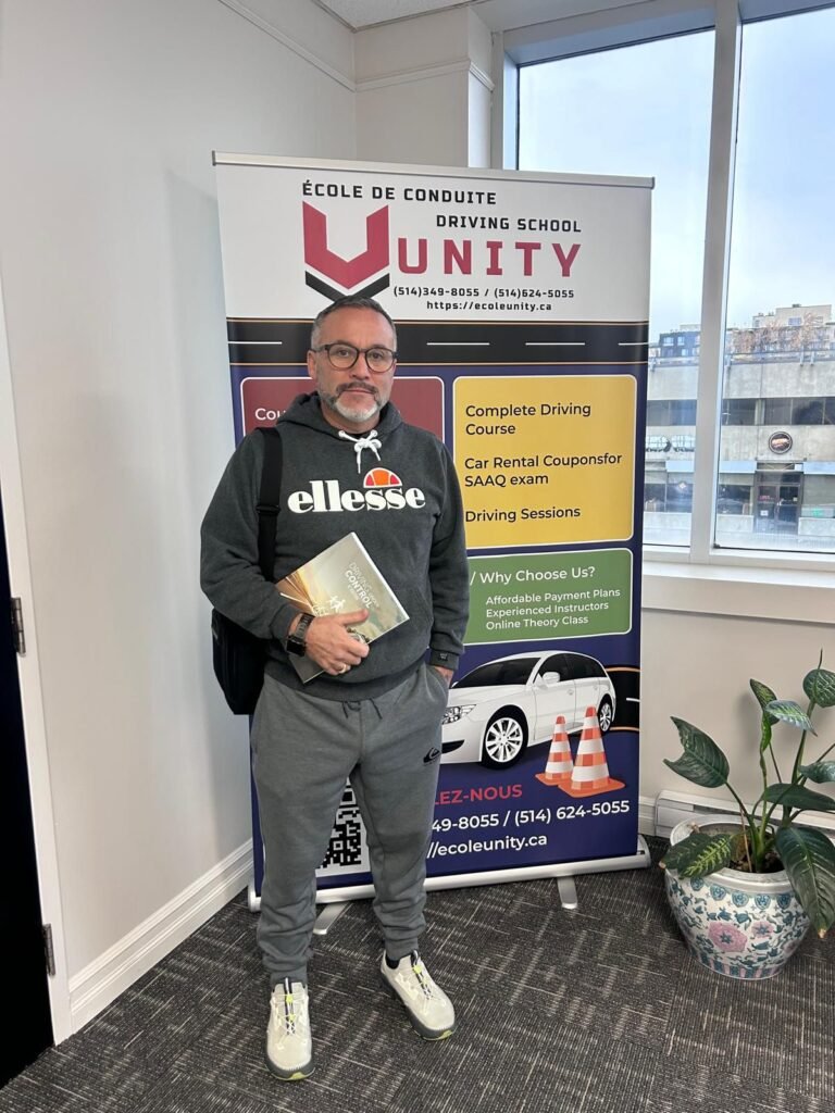 Proud student graduate of Unity Driving School professional training course.