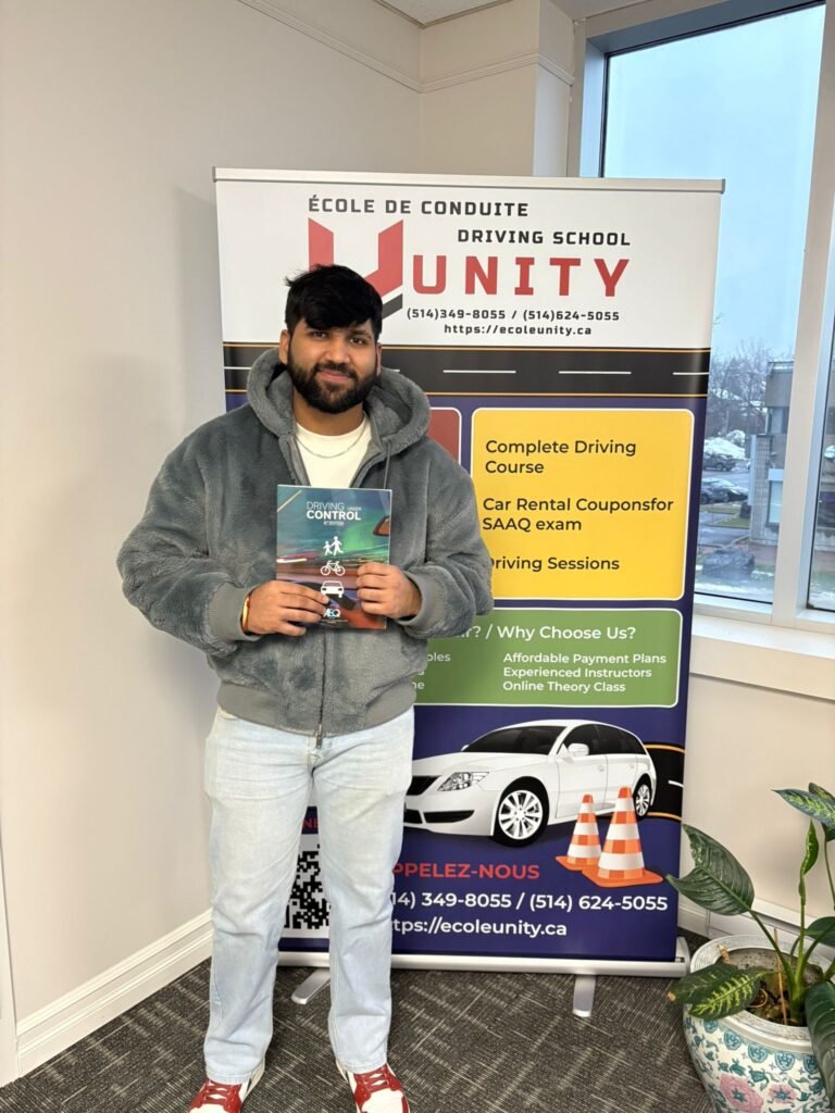 Happy learner driver receiving driving certification